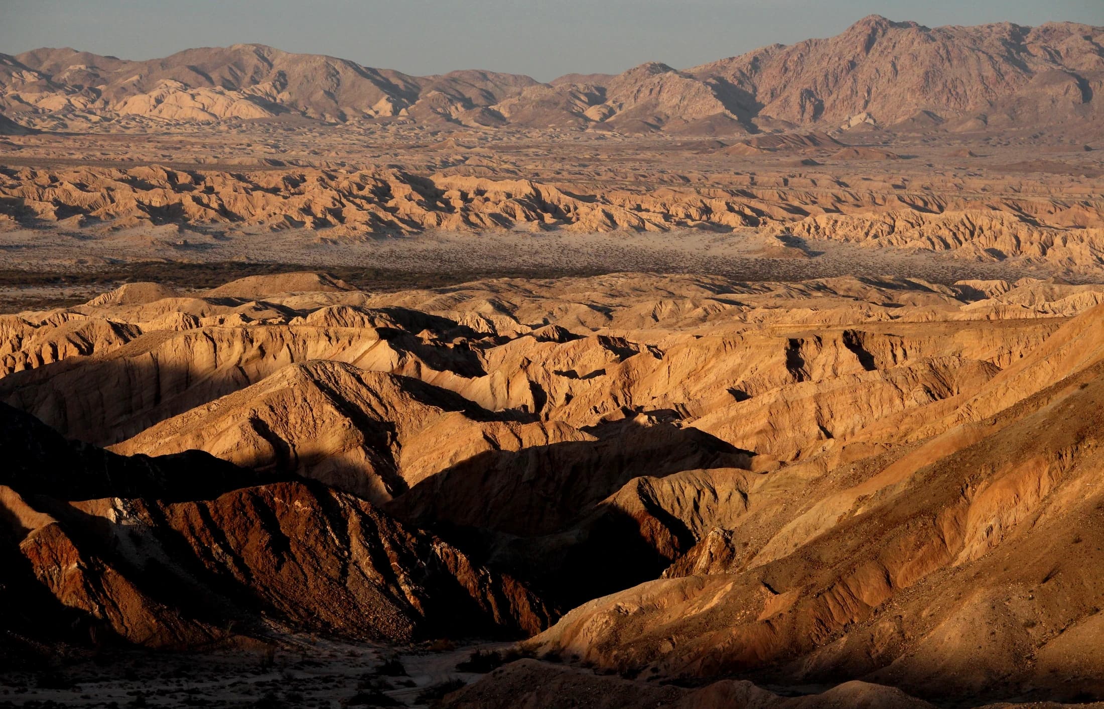 The eroded badlands of the Anza-Borrego desert at low sun